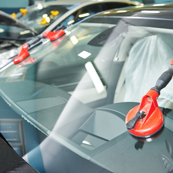Which auto glass service to contact when windshield is damaged  in Massachusetts